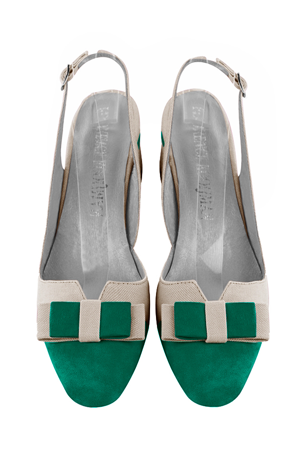 French elegance and refinement for these emerald green and light silver dress slingback shoes, with a knot, 
                available in many subtle leather and colour combinations. The pretty French spirit of this beautiful pump will accompany your steps nicely and comfortably.
To be personalized or not, with your materials and colors.  
                Matching clutches for parties, ceremonies and weddings.   
                You can customize these shoes to perfectly match your tastes or needs, and have a unique model.  
                Choice of leathers, colours, knots and heels. 
                Wide range of materials and shades carefully chosen.  
                Rich collection of flat, low, mid and high heels.  
                Small and large shoe sizes - Florence KOOIJMAN
